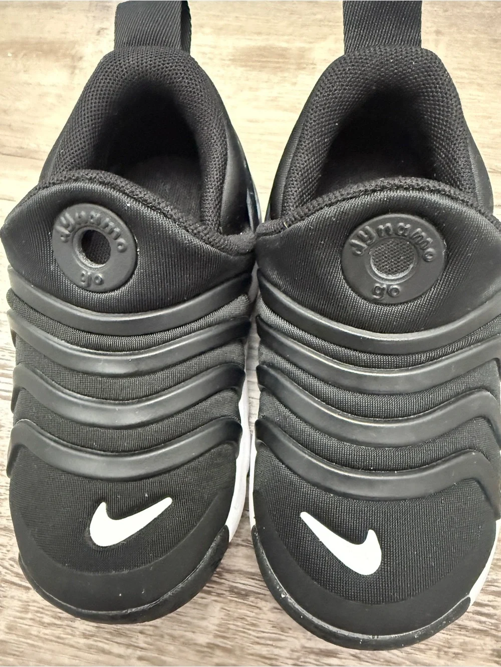 Nike Dynamo Go Kids Black Slip-On Sneakers with White Swoosh